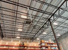 How HVLS Ceiling Fans Improve Airflow, Energy Efficiency, and Workplace Comfort in Large Facilities